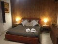 Rooms in the vineyard villa, etna: bedroom.